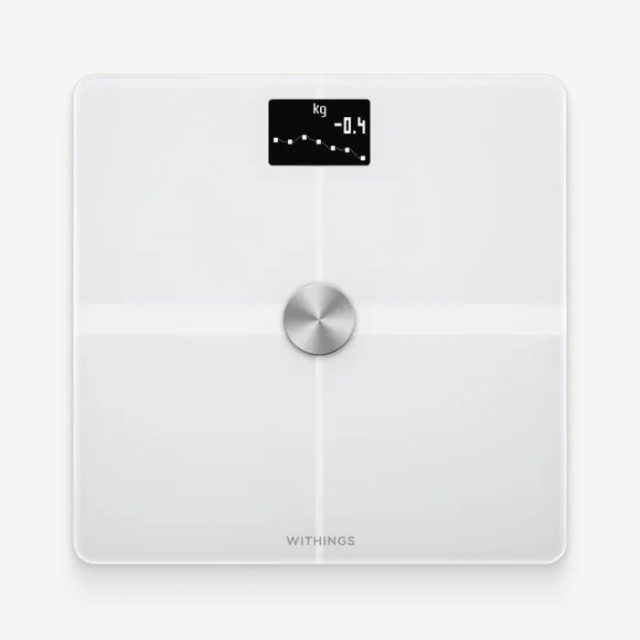 Withings Body+ — White — Top-down view on plain white background, OLED screen showing -0.4 kg weight trend graph — white, minimalist, top view, center dial