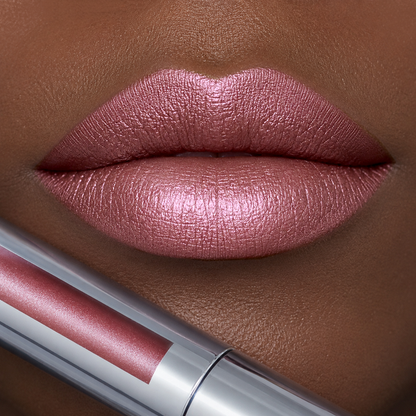 Close-up of a woman's lips wearing Runway Rogue long wear liquid lipstick in the shade 'Boss Babe'