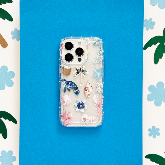Clear phone case with seashell and flower pattern, showcasing a playful, beach-inspired design.