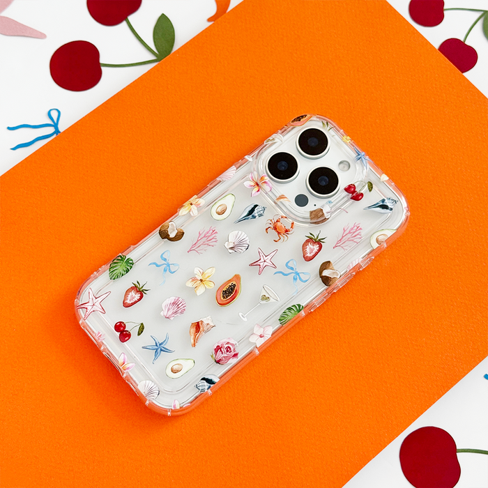 Clear phone case with colorful fruit and ocean pattern on a transparent background.