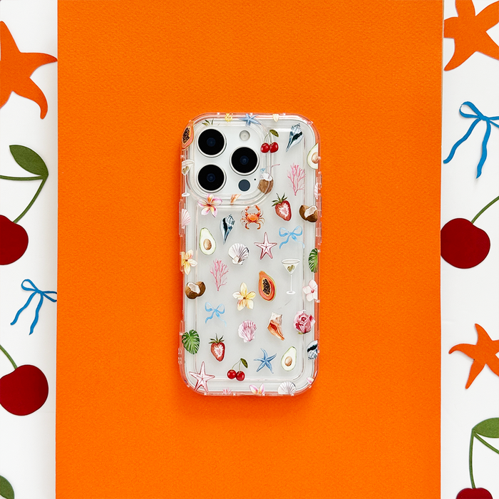 Clear phone case with colorful fruit and floral patterns from Coconut Lane’s Calypso Club collection.