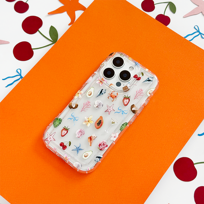 Clear Coconut Lane phone case with colorful fruit and sea patterns on an orange background.