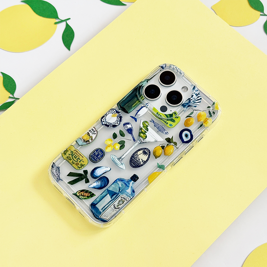 Clear phone case featuring yellow patterns with lemon and bottle stickers, Martini Coast design by Coconut Lane.