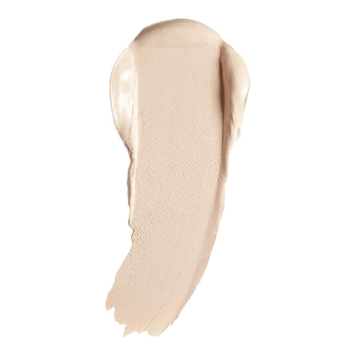 Swatch of cream foundation in the shade 'Charmeuse', a pale shade with neutral undertones.