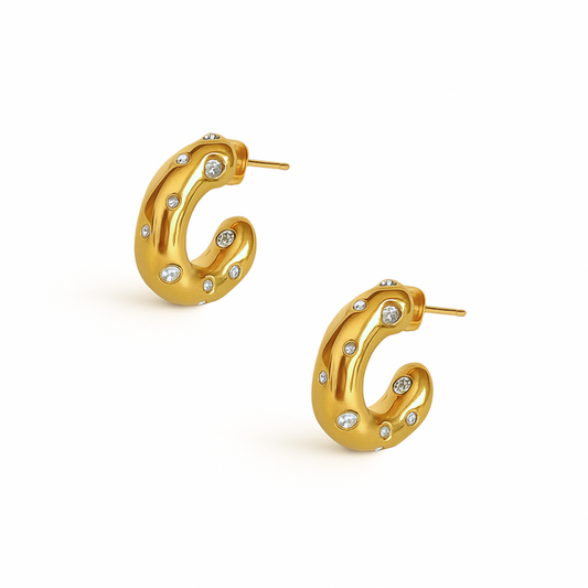Chunky gold hoop earrings with clear gem accents from Coconut Lane.
