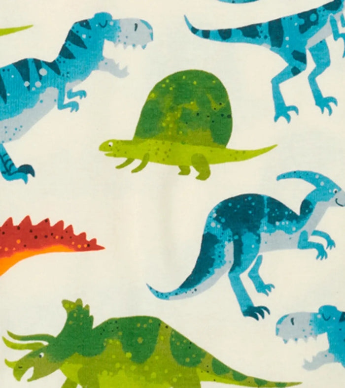 Closeup of Hatley boys Dinosaur Park pajama top showing green neckline and prehistoric print.