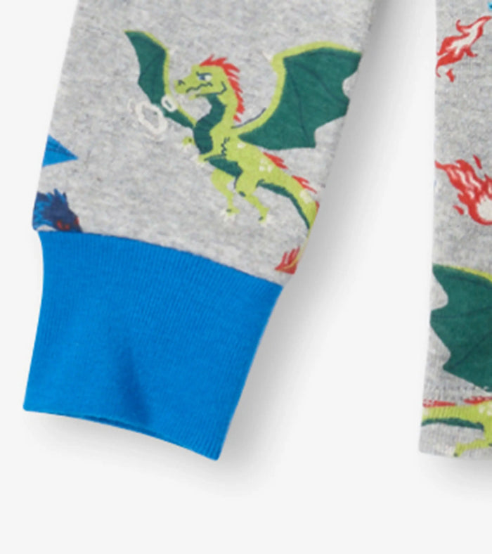 Closeup of Hatley boys pajama cuff with blue trim and Dragon Realm print.