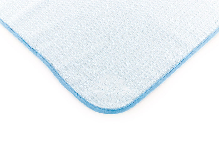 Dry Me a River light blue corner view on a white background.