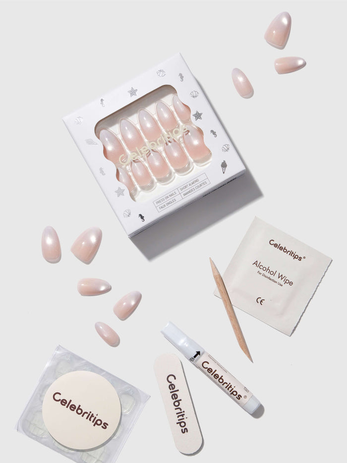 Celebritips nail product set with press-on nails box, alcohol wipes, and applicator on a light background