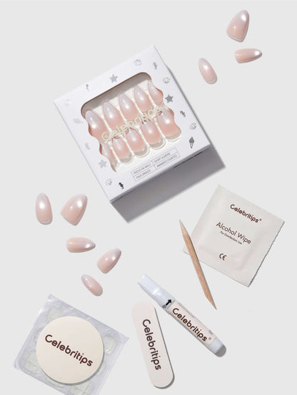 Celebritips nail product set with press-on nails box, alcohol wipes, and applicator on a light background