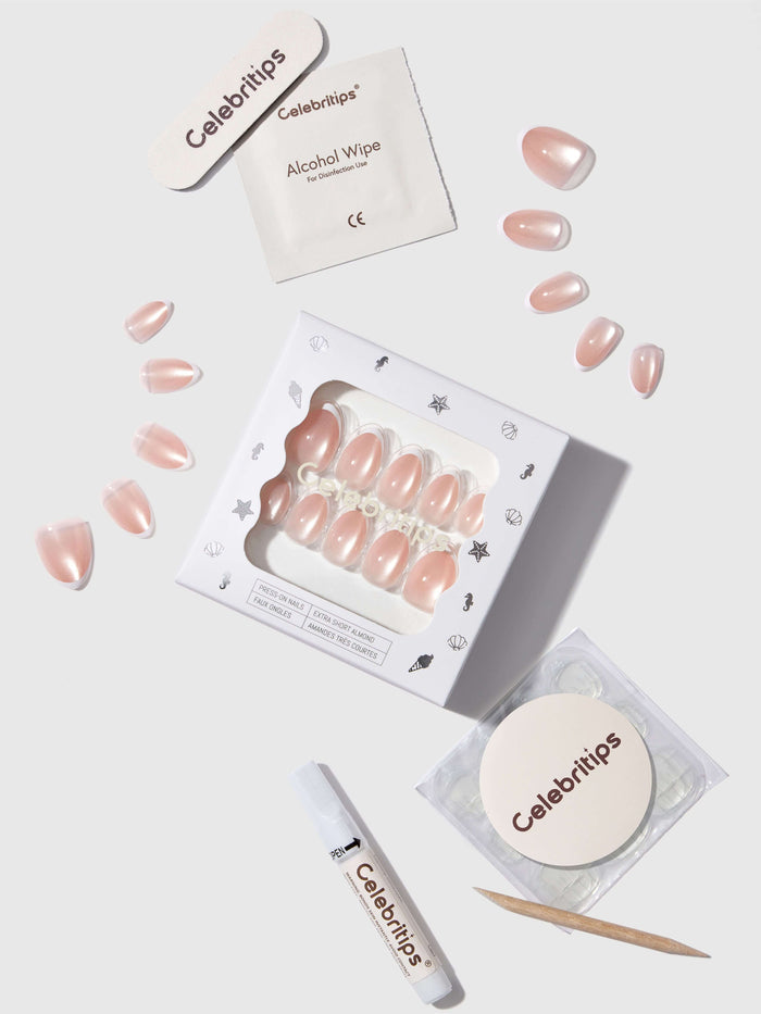 Celebritips nail art supplies including press-on nails, alcohol wipes, and application materials on a white background.