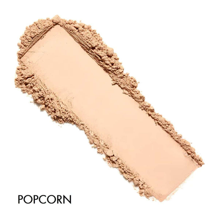 Cosmetic powder swatch shade 'Popcorn' on a white background