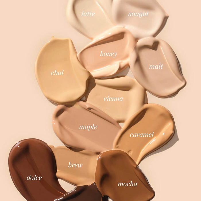 Oat Milk Foundation swatches on a beige background.