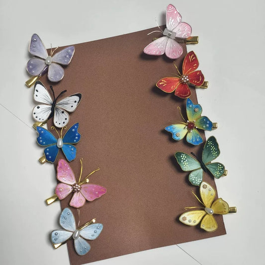 Ten styles of handcrafted Ronghua silk velvet butterfly hair clips in various colors including blue, pink, red, green, and yellow, arranged on a brown card.