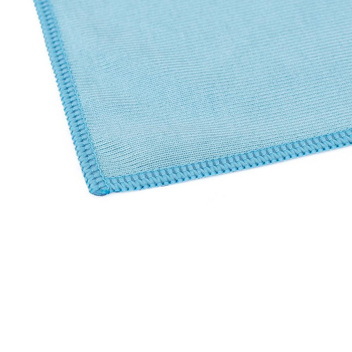 The corner of a blue Premium Glass & Window microfiber towels from The Rag Company