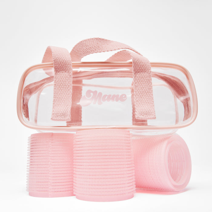Roll & Scroll Self-Grip Rollers with clear pink case on top of them