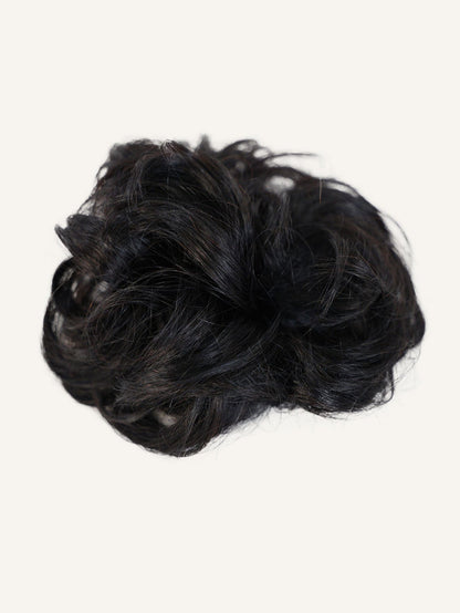 A loose bun-shaped Scrunchie Hair Extension by Perfect Locks in Warm Chestnut Brown , with synthetic Remy-like hair on a white background.#color_natural-black-(1B)
