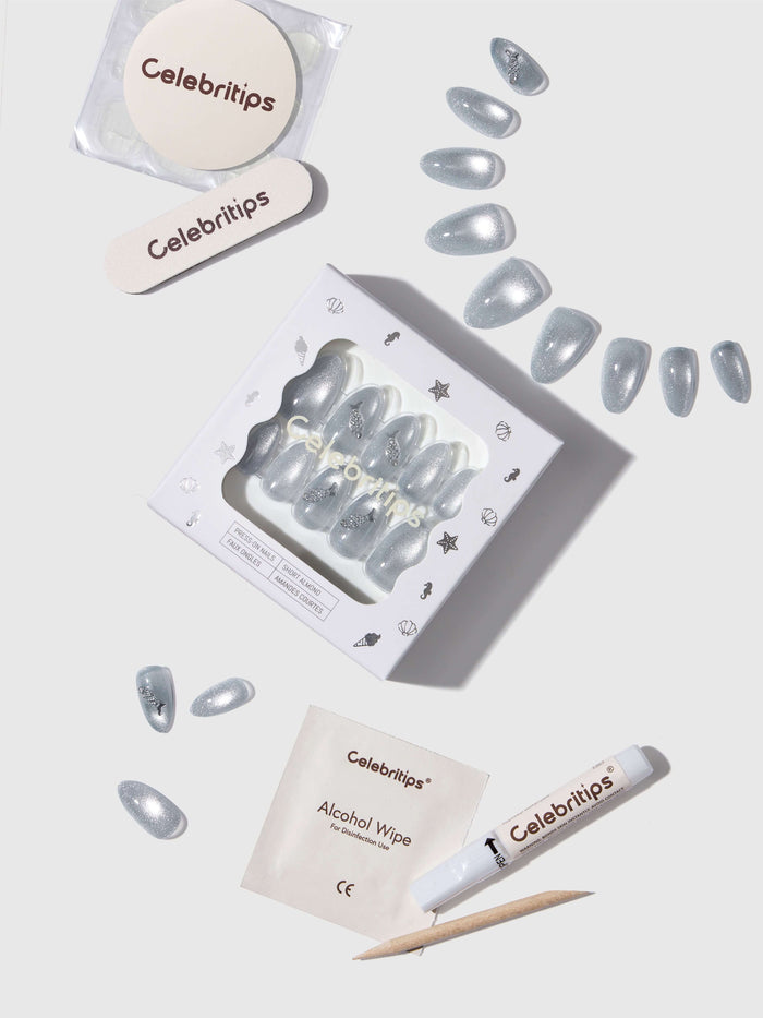 Set of sparkling press-on nails with Celebritips branding on a light background