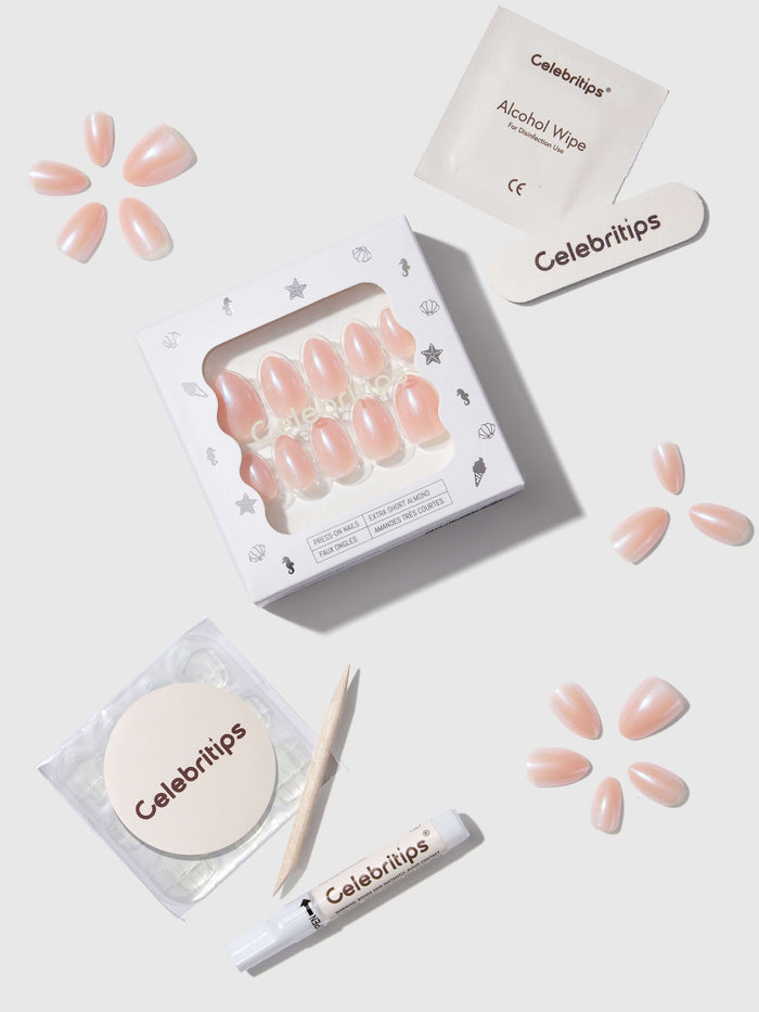 Celebritips press-on nail products including a box of nails, alcohol wipes, and applicator on a white background.
