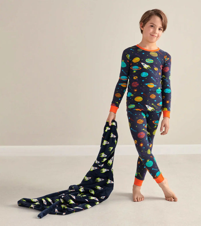 Boy wearing Hatley Space Explorer pajamas with soft organic cotton and snug-fitting comfort.
