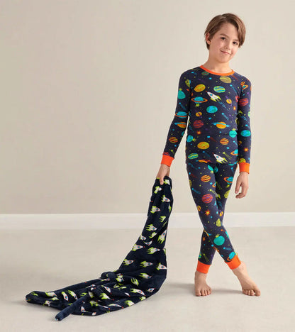 Boy wearing Hatley Space Explorer pajamas with soft organic cotton and snug-fitting comfort.