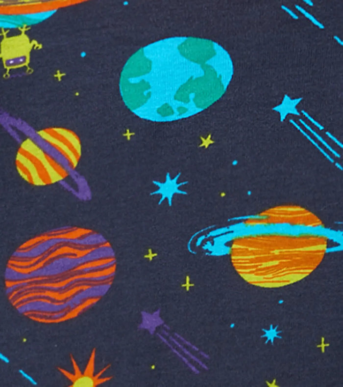 Closeup of Hatley boys space print with planets, rockets, stars, and Navy organic cotton fabric.
