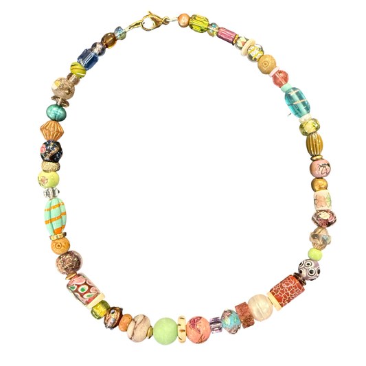 Colorful beaded necklace on a white background